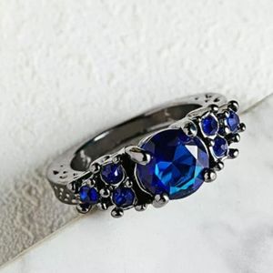 2 for 8$ Sapphire CZ  Black Rhodium Plated size 6